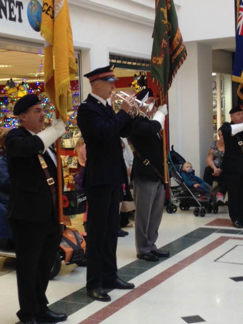 Julian Brand playing The Last Post in Eastgate Shopping Centre